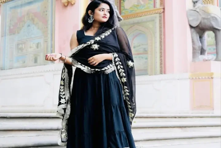 Black Rayon Gotapatti 4-Tier Suit with Dupatta (Without Pant) Grace your festive and special occasions with this Black Rayon Gotapatti 4-Tier Suit, a timeless piece that blends elegance with tradition. Crafted from soft and flowy rayon fabric, this suit features a 4-tier flared design beautifully adorned with intricate gotapatti work, adding a festive sparkle to your look.