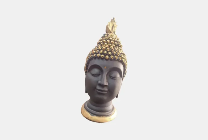 Bring serenity and positive vibes into your home with this beautifully crafted Black & Gold Buddha Head Showpiece from Pitstop Mart. This elegant decorative piece features a peaceful expression and intricate detailing, especially in the gold-finished curls and topknot. Made from durable material with a matte black finish and highlighted with golden accents, it adds a spiritual and aesthetic charm to any room.