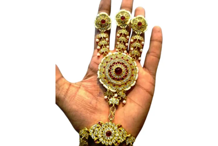 trending Hathphool collection, inspired by royal Indian traditions and modern fashion. Each piece is beautifully handcrafted, featuring intricate detailing, premium stones, pearls, and gold-plated finishing — perfect for brides, festive occasions, and party looks.