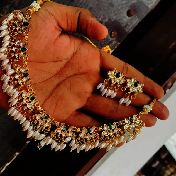Embrace divine elegance with our Lotus Jewellery Set, a symbol of purity, beauty, and serenity. Inspired by the sacred lotus flower, this exquisite set features delicate craftsmanship, floral motifs, and sparkling stones that radiate timeless charm. Perfect for weddings, festive events, or evening gatherings, the Lotus Set enhances your natural grace with its artistic detailing.