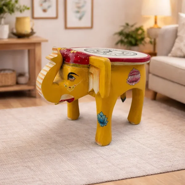 Bring home the beauty of traditional craftsmanship with this Handcrafted Wooden Elephant Stool – 10 Inch. Expertly carved by skilled artisans, this stool features a majestic elephant design symbolizing strength, wisdom, and good luck. Its detailed hand-work and polished wood finish make it a stunning décor addition to any room. Made from premium solid wood, the stool is sturdy, durable, and designed for long-term use. The 16-inch height provides the perfect balance between functionality and decoration—ideal for use as a side stool, plant stand, footrest, bedroom décor, living room accent piece, or as a unique gifting option for special occasions.