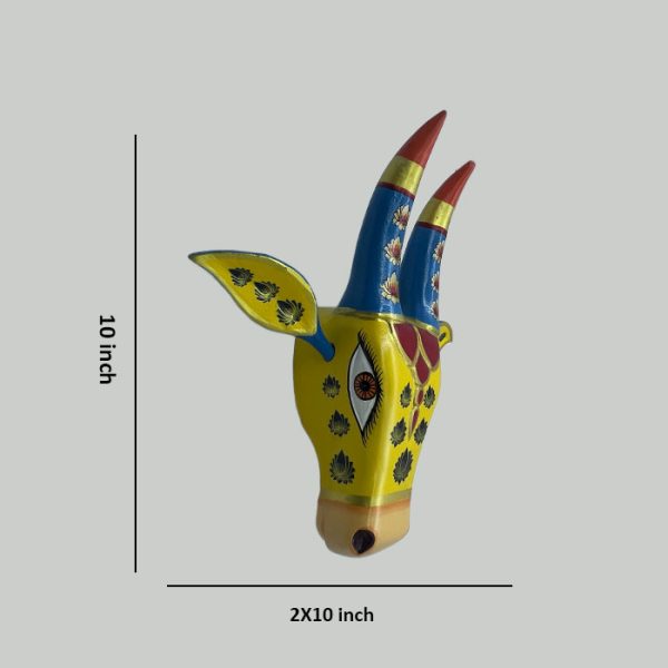 Handcrafted Design: Expertly handcrafted cow head wall hanging inspired by traditional Indian art and culture. Hand-Painted Finish: Decorated with vibrant, long-lasting colors and detailed artwork for an elegant look. Perfect Home Décor: Ideal for living room, pooja room, entrance, office, or any interior wall space. Easy to Hang: Lightweight construction with a convenient hanging provision for quick installation. Ideal for Gifting: A thoughtful choice for housewarming, festive occasions, weddings, and special celebrations. Size: Approx. 15 inch height (minor variations may occur due to handcrafted nature).